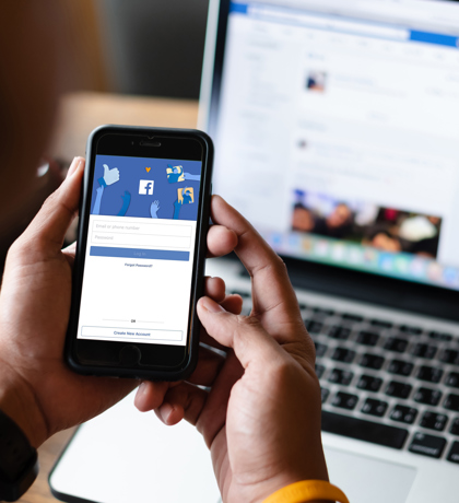 facebook-social-media-app-on-smartphone-and-laptop.jpg