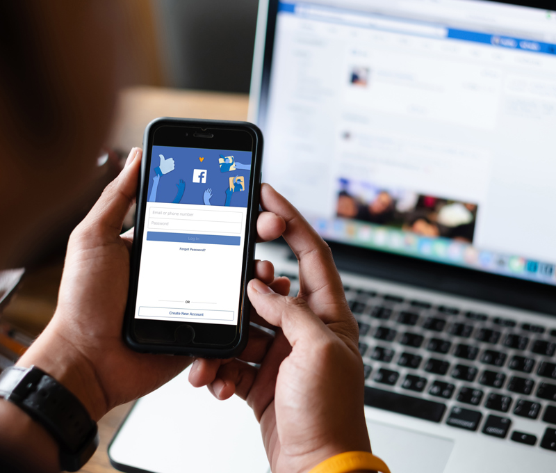 facebook-social-media-app-on-smartphone-and-laptop.jpg
