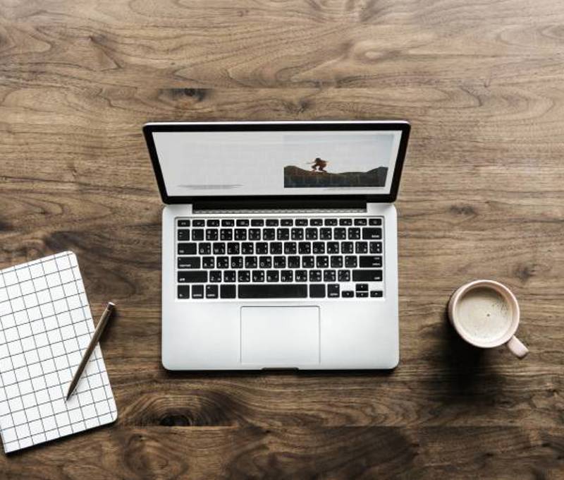 aerial-view-computer-laptop-wooden-table-workspace-concept (1).jpg